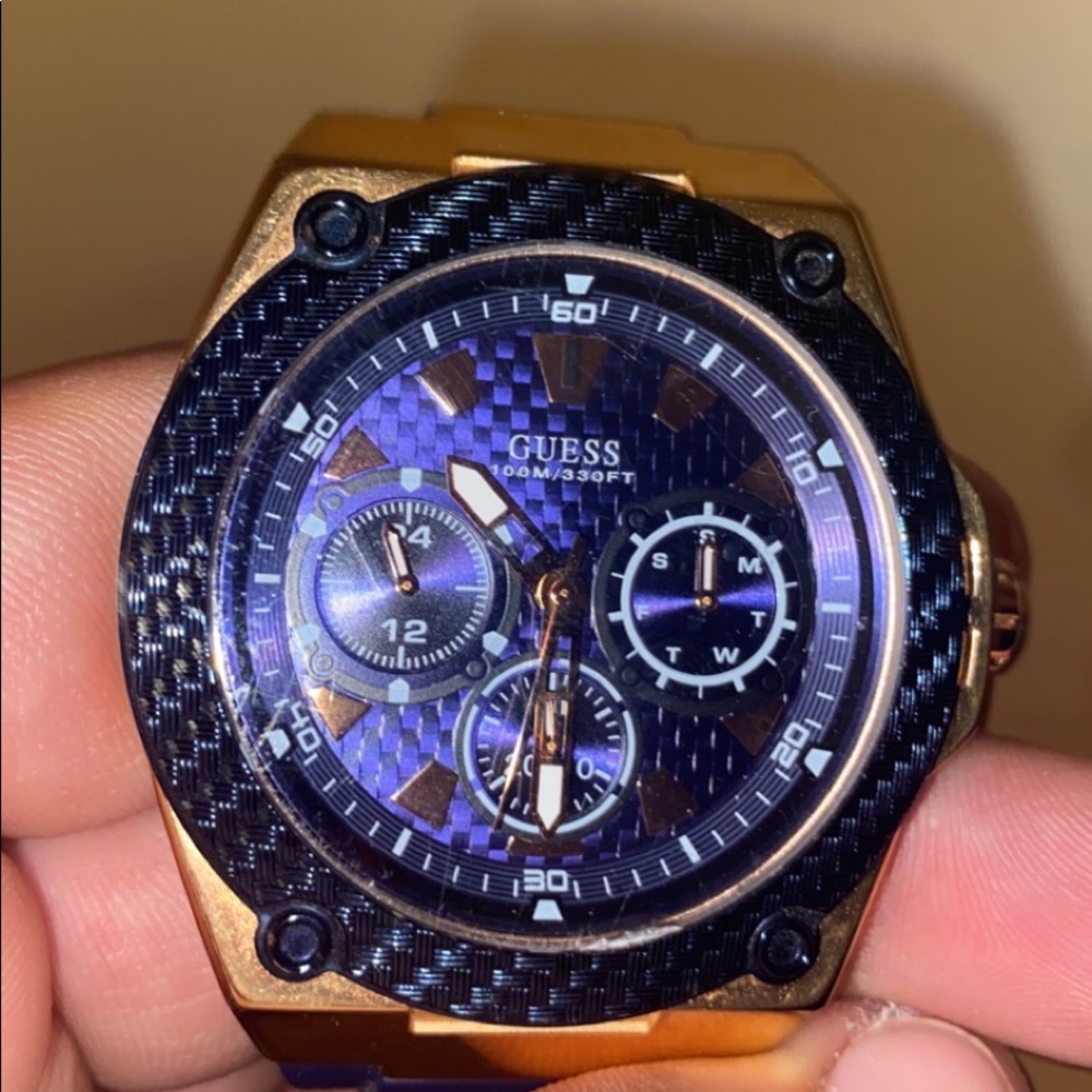 Guess mens watch. Purple face blue strap.